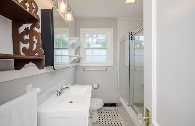 2217 Montclair St, Augusta, GA 30904 - bathroom with vanity and bath / shower combo with glass door