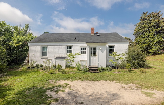 2217 Montclair St, Augusta, GA 30904 - rear view of property featuring brick siding, a chimney, and entry steps
