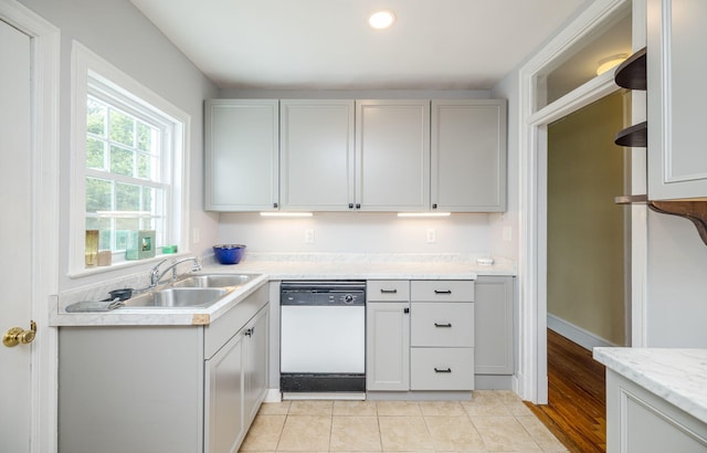 2217 Montclair St, Augusta, GA 30904 - kitchen with dishwasher, light countertops, light tile patterned floors, recessed lighting, and gray cabinets