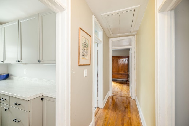 2217 Montclair St, Augusta, GA 30904 - corridor featuring attic access and light wood-style floors
