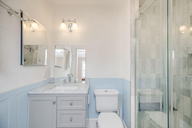 2217 Montclair St, Augusta, GA 30904 - full bath featuring a shower stall, vanity, and wainscoting
