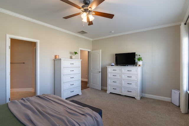 bedroom featuring light carpet, baseboards, visible vents, and ornamental molding