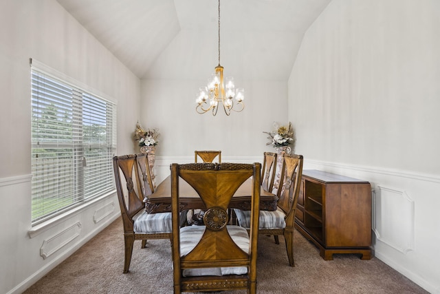 5315 Bull St, Augusta, GA 30909 - carpeted dining room featuring a chandelier, vaulted ceiling, and wainscoting