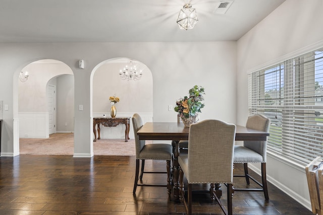 5315 Bull St, Augusta, GA 30909 - dining area featuring hardwood / wood-style flooring, arched walkways, and a chandelier