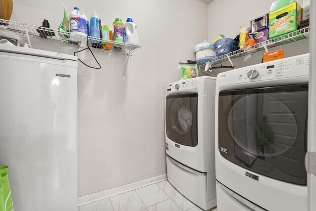 5315 Bull St, Augusta, GA 30909 - washroom featuring light marble finish floors and independent washer and dryer