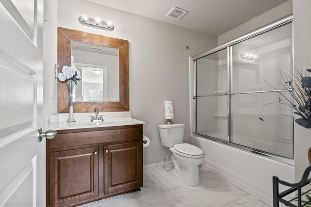 5315 Bull St, Augusta, GA 30909 - full bathroom featuring vanity, enclosed tub / shower combo, and marble finish flooring