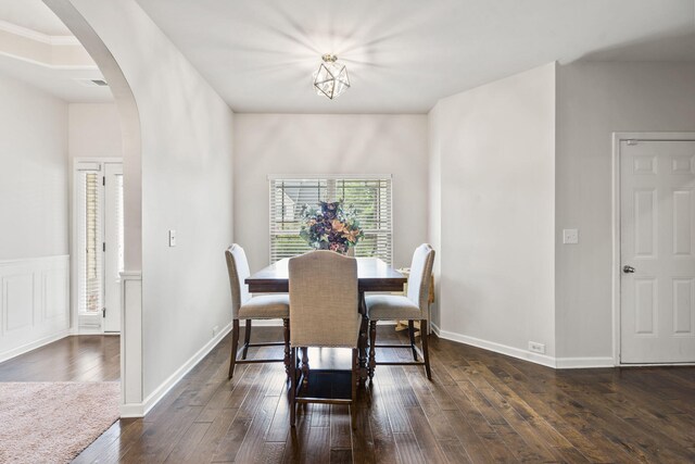 5315 Bull St, Augusta, GA 30909 - dining room with arched walkways and dark wood-type flooring
