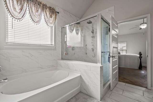 5315 Bull St, Augusta, GA 30909 - full bathroom featuring a bath, a stall shower, marble look tiles, ceiling fan, and lofted ceiling
