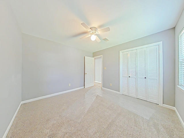4373 Quail Creek Rd, Martinez, GA 30907 - unfurnished bedroom featuring light carpet, a closet, and ceiling fan