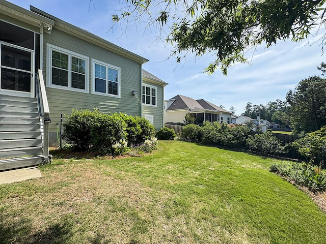 view of yard featuring fence