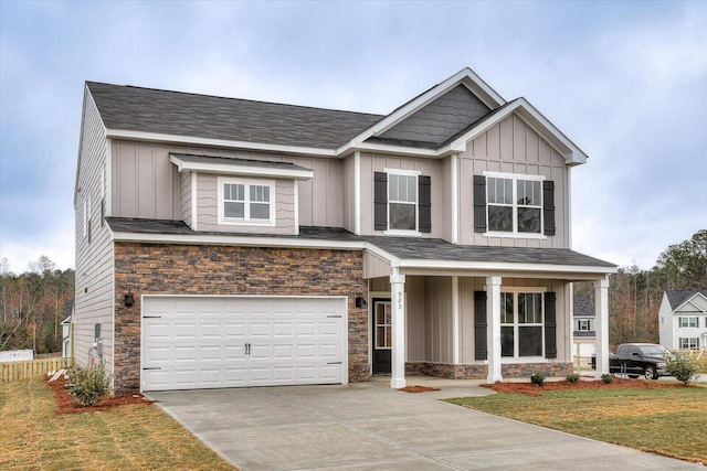 839 Sweetgrass Cir, Harlem, GA 30814 - craftsman-style home with stone siding, a garage, and board and batten siding