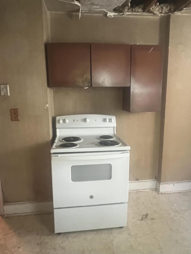 824 Ann St, Augusta, GA 30904 - kitchen featuring white range with electric stovetop and baseboards