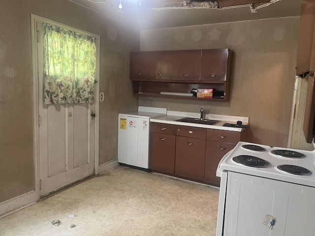 824 Ann St, Augusta, GA 30904 - kitchen featuring electric stove, fridge, light floors, and light countertops
