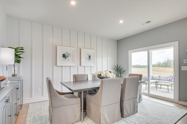 dining space with light wood-type flooring