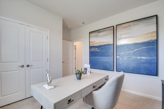 office area with light colored carpet