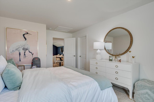 bedroom featuring light carpet