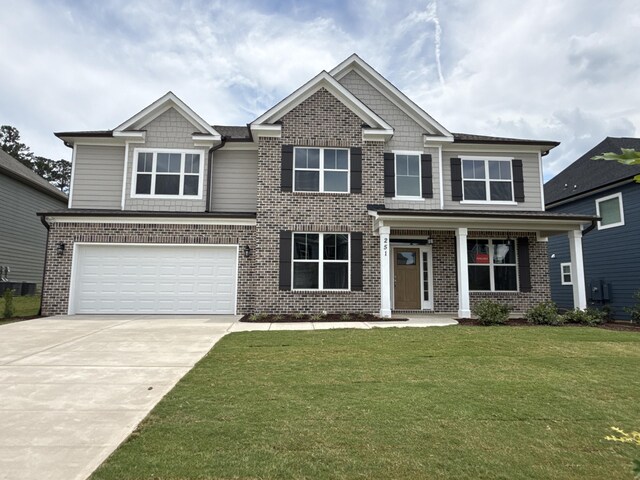 251 Prominence Dr, Grovetown, GA 30813 - craftsman inspired home featuring brick siding, concrete driveway, an attached garage, and a front lawn
