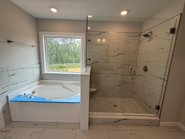 251 Prominence Dr, Grovetown, GA 30813 - full bathroom with a garden tub, a shower stall, and marble look tile flooring