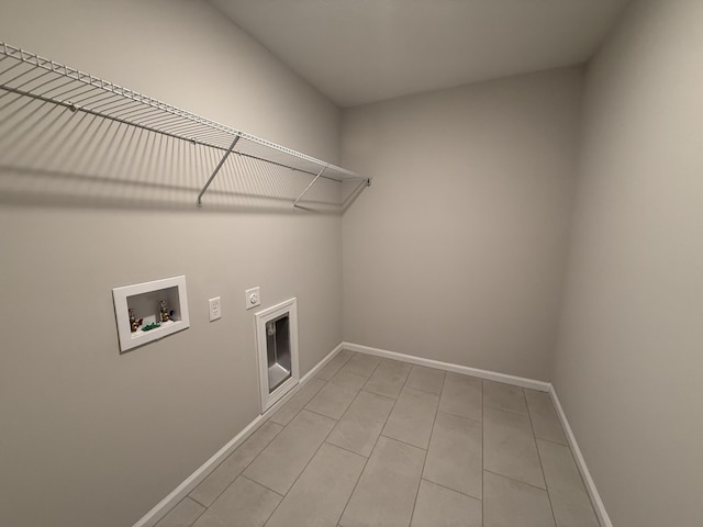 251 Prominence Dr, Grovetown, GA 30813 - laundry area featuring hookup for an electric dryer, hookup for a washing machine, and light tile patterned flooring