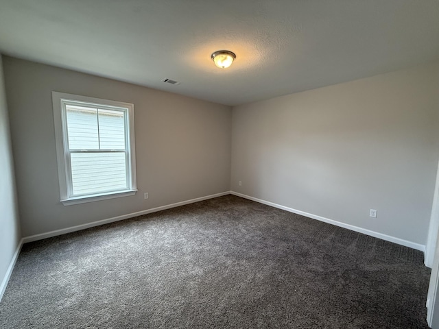 251 Prominence Dr, Grovetown, GA 30813 - unfurnished room with dark carpet and baseboards