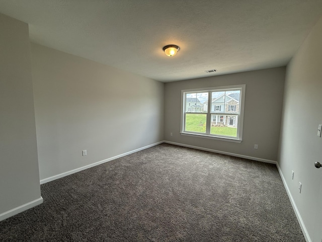 251 Prominence Dr, Grovetown, GA 30813 - carpeted empty room with baseboards and a textured ceiling
