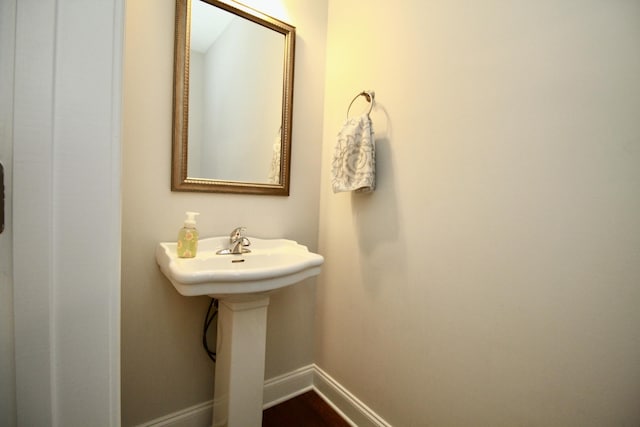 144 Caroleton Dr, Grovetown, GA 30813 - bathroom featuring baseboards and a sink