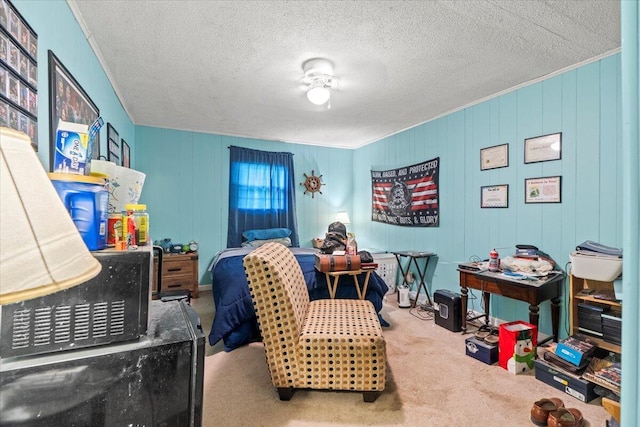 carpeted bedroom featuring a textured ceiling