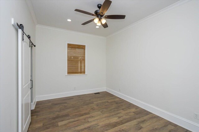 925 Beman St, Augusta, GA 30904 - spare room featuring ceiling fan, a barn door, dark wood-style floors, recessed lighting, and baseboards