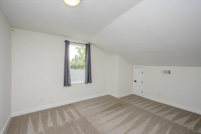 925 Beman St, Augusta, GA 30904 - additional living space with carpet, vaulted ceiling, and baseboards