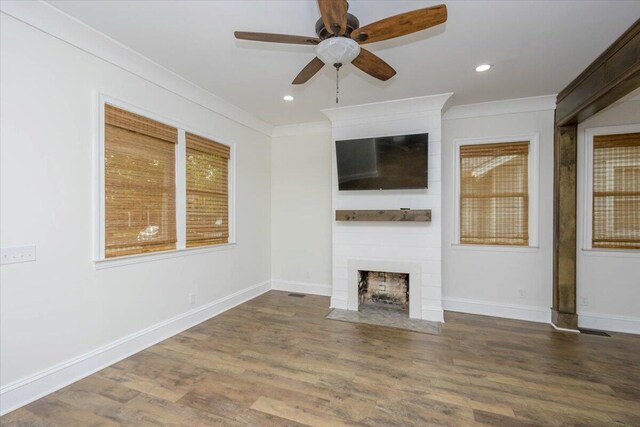 925 Beman St, Augusta, GA 30904 - unfurnished living room with a fireplace, a ceiling fan, ornamental molding, wood finished floors, and baseboards