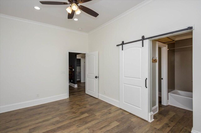 925 Beman St, Augusta, GA 30904 - unfurnished bedroom with ornamental molding, wood finished floors, a barn door, baseboards, and recessed lighting