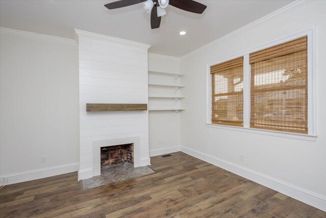 925 Beman St, Augusta, GA 30904 - unfurnished living room with a ceiling fan, wood finished floors, crown molding, a large fireplace, and baseboards