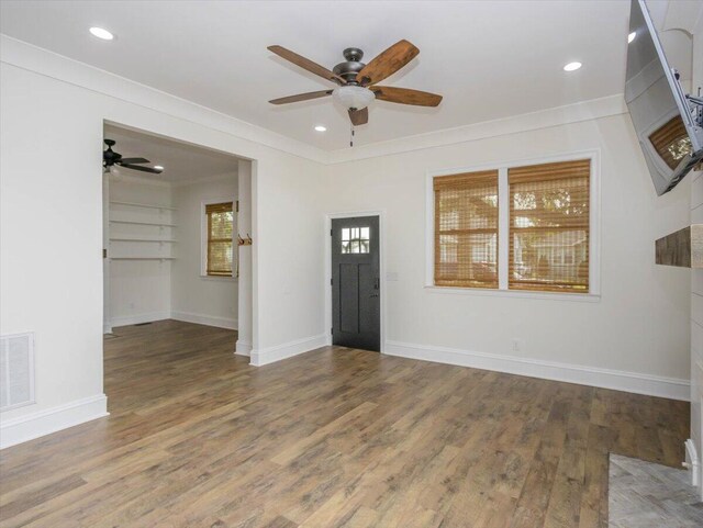 925 Beman St, Augusta, GA 30904 - spare room with a ceiling fan, wood finished floors, baseboards, recessed lighting, and crown molding