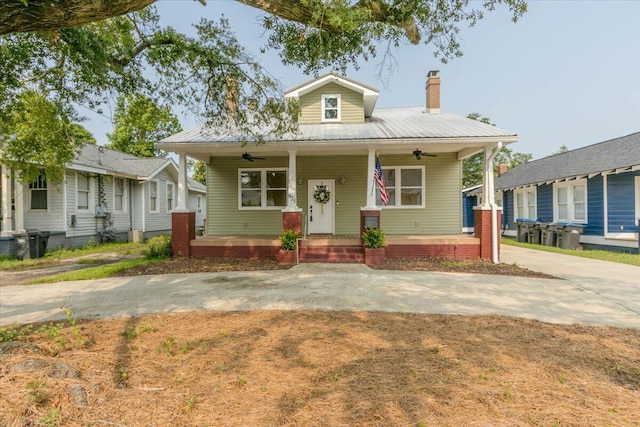 925 Beman St, Augusta, GA 30904 - bungalow-style house featuring a ceiling fan, covered porch, metal roof, and a chimney