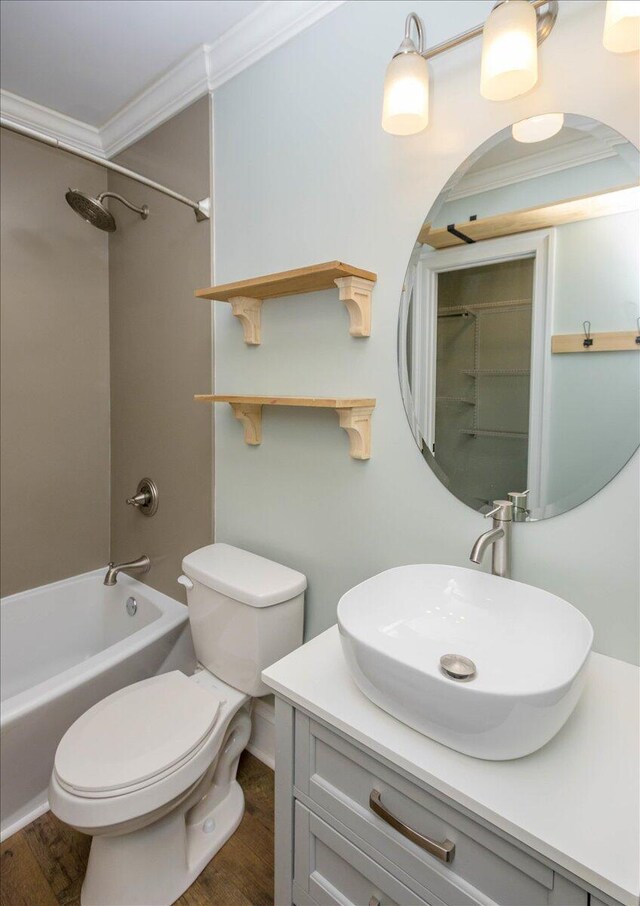 925 Beman St, Augusta, GA 30904 - full bath with crown molding, bathtub / shower combination, vanity, toilet, and wood finished floors
