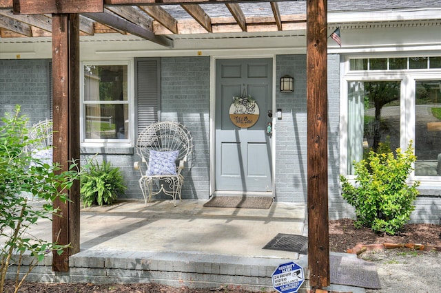 208 Elm St, Grovetown, GA 30813 - view of exterior entry featuring brick siding