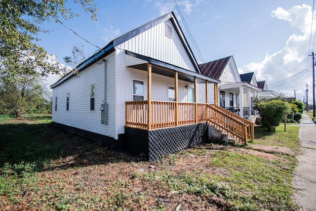 view of home's exterior with covered porch