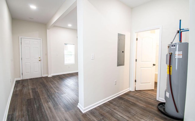 corridor featuring water heater, dark wood-type flooring, beamed ceiling, and electric panel