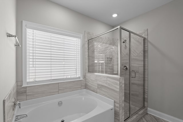647 Bunchgrass St, Evans, GA 30809 - full bathroom with a garden tub, a stall shower, and recessed lighting