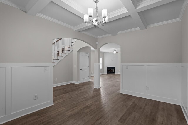 647 Bunchgrass St, Evans, GA 30809 - spare room with a ceiling fan, a chandelier, arched walkways, beam ceiling, and coffered ceiling