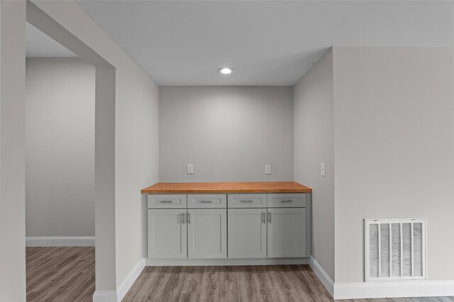 647 Bunchgrass St, Evans, GA 30809 - bar area featuring light wood-style floors, baseboards, and recessed lighting