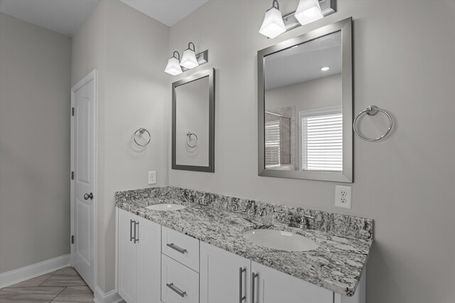 647 Bunchgrass St, Evans, GA 30809 - full bath with double vanity, a shower, and baseboards