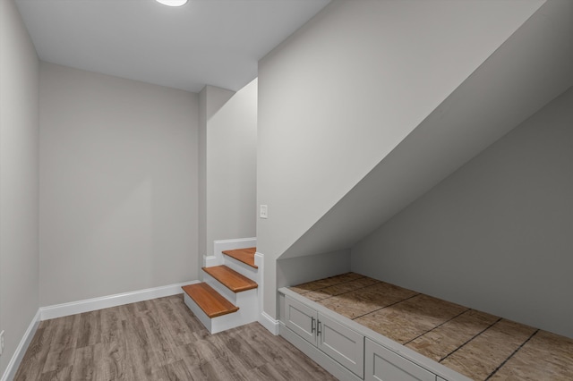 647 Bunchgrass St, Evans, GA 30809 - stairs with wood finished floors and baseboards