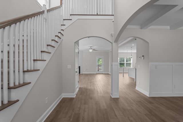 647 Bunchgrass St, Evans, GA 30809 - foyer entrance with ceiling fan, wood finished floors, crown molding, baseboards, and stairway