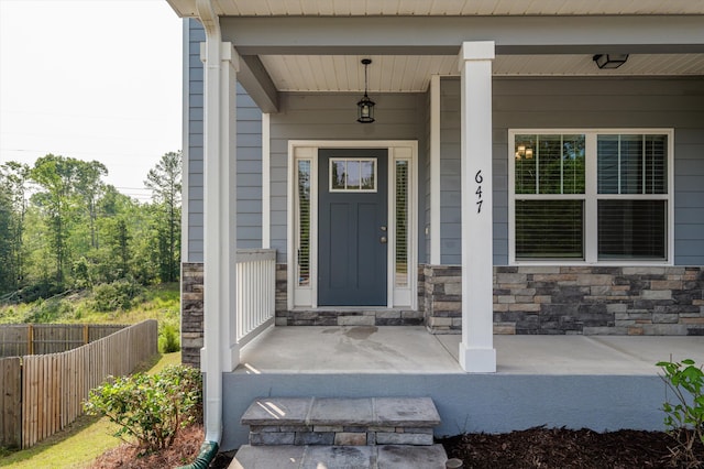 647 Bunchgrass St, Evans, GA 30809 - property entrance featuring stone siding and covered porch
