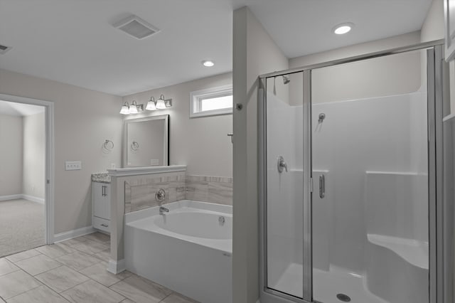 647 Bunchgrass St, Evans, GA 30809 - full bath with a shower stall, vanity, a bath, baseboards, and recessed lighting