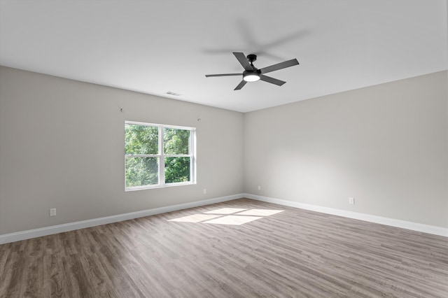647 Bunchgrass St, Evans, GA 30809 - spare room with wood finished floors, baseboards, and ceiling fan
