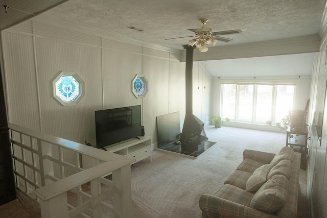 114 Bordeaux St, North Augusta, SC 29841 - carpeted living room with a ceiling fan and a textured ceiling