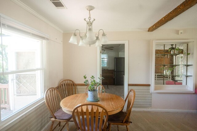 114 Bordeaux St, North Augusta, SC 29841 - carpeted dining space featuring a chandelier, baseboards, crown molding, and a ceiling fan