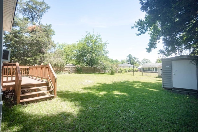 114 Bordeaux St, North Augusta, SC 29841 - view of yard with a storage shed, a deck, and an outdoor structure